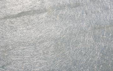 Holewater laminate fibreglass or shingles?